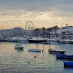 assorted boat lot on body of water